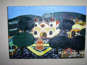 Outra cidadezinha do interior, com uma praça e seu coreto.