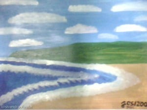 As ondas do mar que se dispersam na praia.