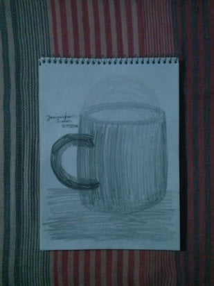 Caneca de leite.
