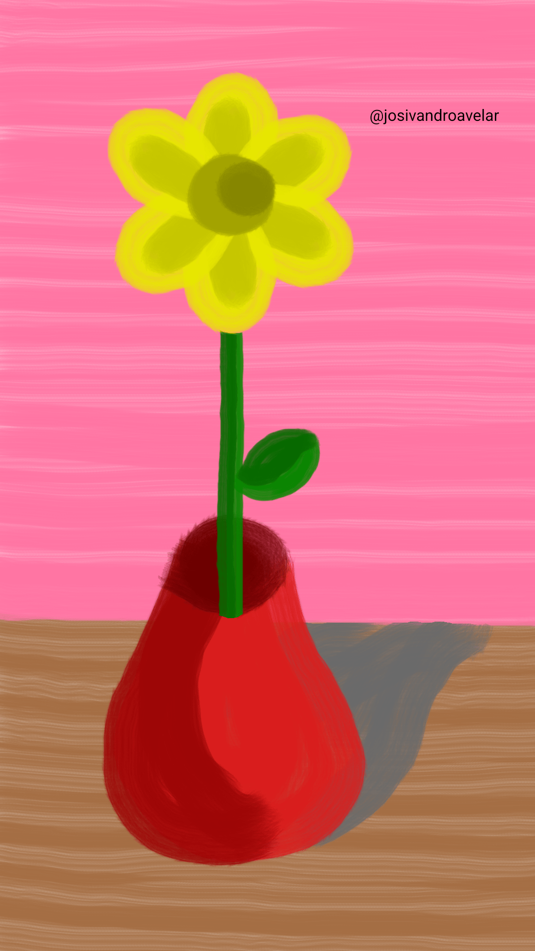 Artes digitais: vaso com flor 1 Um vaso com flor, em uma mesa de madeira, atrás de um fundo rosa.