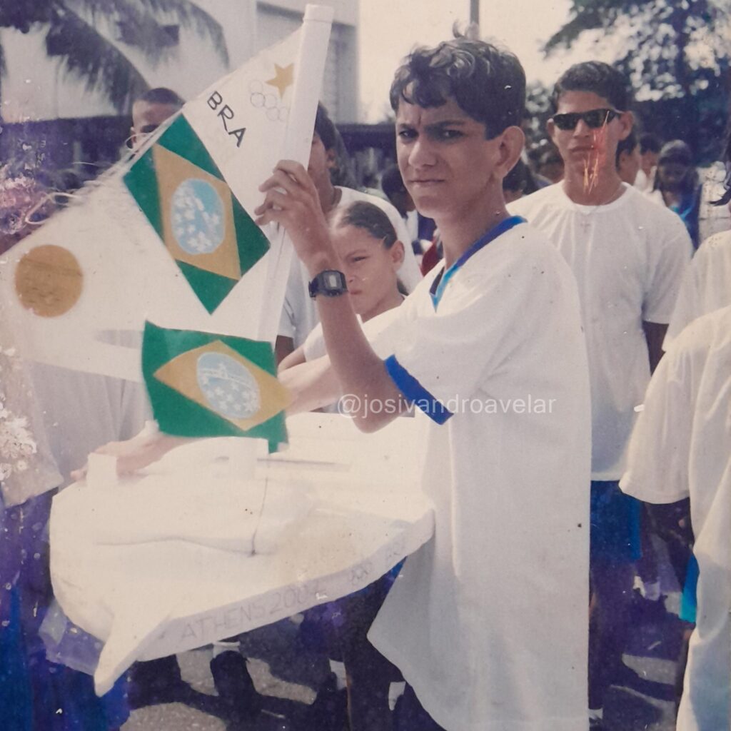 A vela olímpica 2 Eu e o barco a vela no desfile cívico de 2004.